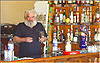 The host behind the bar